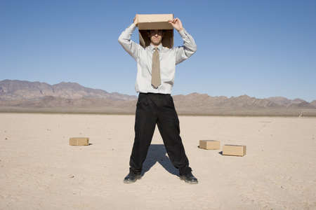 Man with a box over his headの写真素材