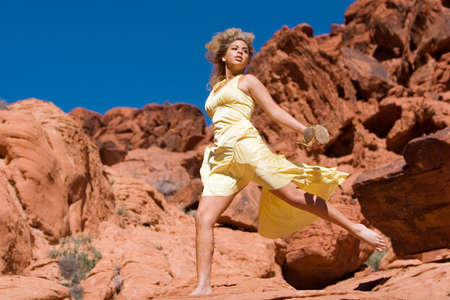 Sexy blonde woman posing outdoors in fashionの写真素材