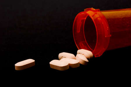 Prescription medicine on black background