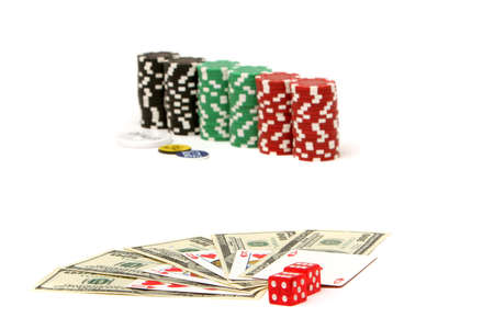 Royal flush poker hand and hundred dollar bills