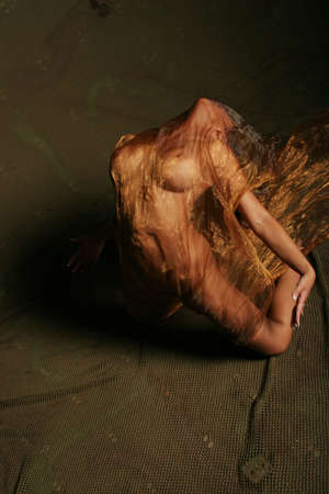 Beautiful sexy woman in silkの写真素材