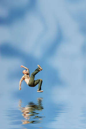 Man jumping on red rocks