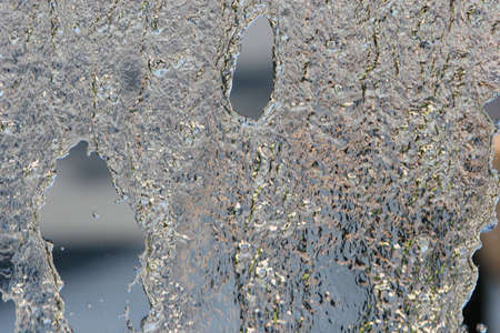 Water pouring over glass