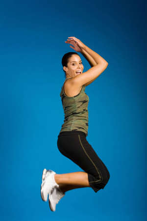 Woman in fitness outfit exercising