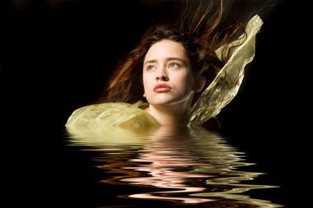 Beautiful young woman in silk