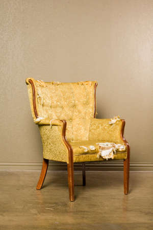 Antique chair in need of upholsteryの写真素材