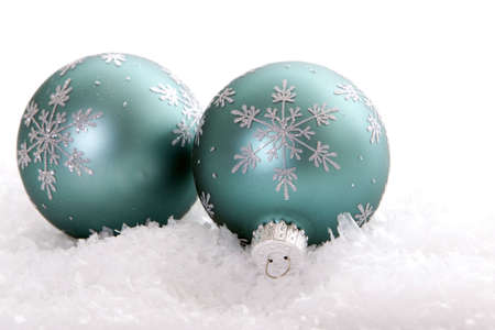 Beautiful Christmas ornaments in snowの写真素材