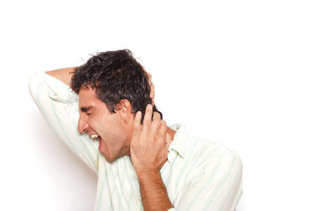 Screaming man with angry expressionの写真素材