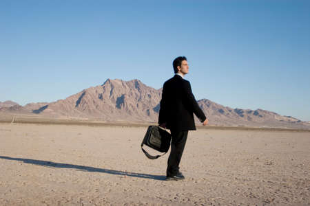 Businessman carrying his laptop caseの写真素材