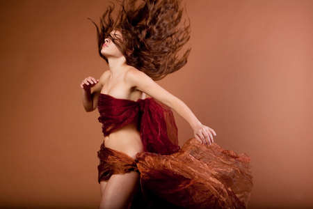 Pretty sexy woman doing a hairflipの写真素材