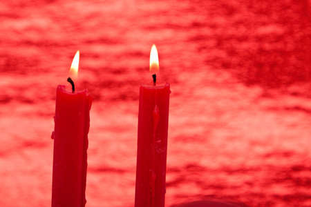 Pair of beautiful Christmas candlesの写真素材