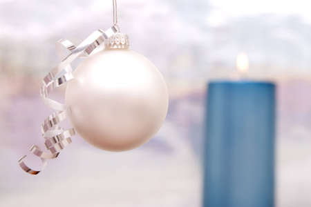 Beautiful Christmas decor with ornament and candleの写真素材