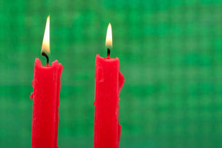 Pair of beautiful Christmas candlesの写真素材