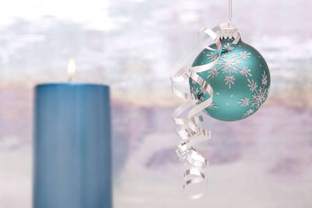 Beautiful Christmas decor with ornament and candleの写真素材