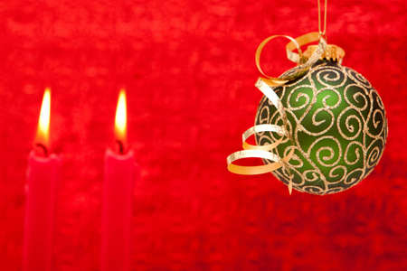Beautiful Christmas decor with ornament and candleの写真素材