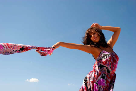 Beautiful woman in dress outdoorsの写真素材