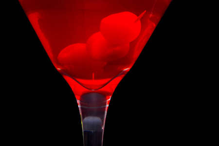 Red martini with cherriesの写真素材