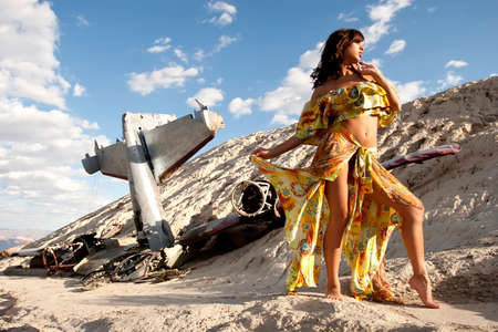 Sexy girl and crashed planeの写真素材