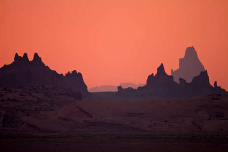 Rock formation silhouettes during sunset in northern arizona desertの写真素材
