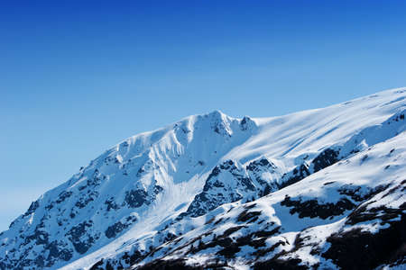 Snowy mountain peaks in Alaskaの写真素材