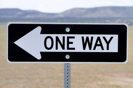 One way road sign at desert
