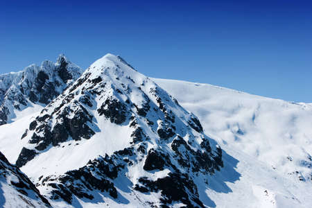 Snowy mountain peaks in Alaskaの写真素材