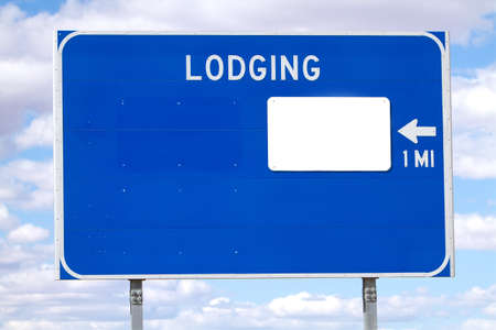 Lodging one mile ahead sign