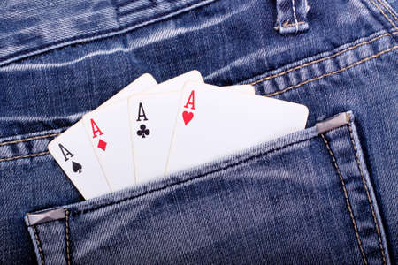 Four of a kind aces in blue jeans pocketの写真素材