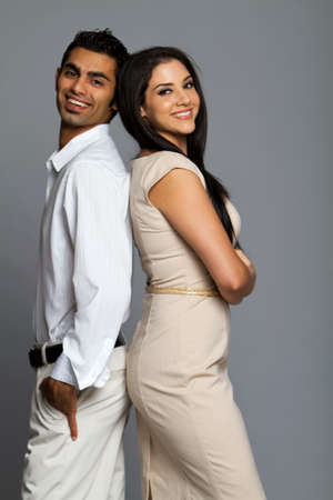 Professional ethnic couple in business clothesの写真素材