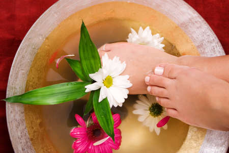 Woman taking care of her feetの写真素材