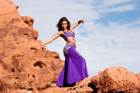 Beautiful sexy bellydancer in the desertの写真素材