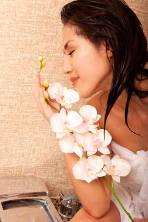 Beautiful japanese woman in bathroom with towelsの写真素材