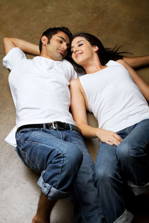 Sexy young ethnic couple in loveの写真素材