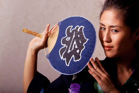 Gorgeous japanese woman wearing kimono robeの写真素材