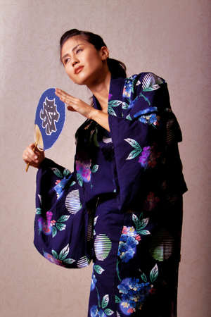 Gorgeous japanese woman wearing kimono robeの写真素材