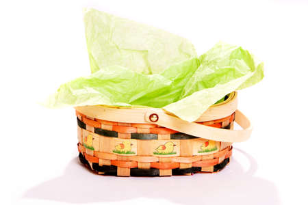 Decorative easter basket on isolated white backgroundの写真素材