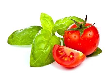 tomato of Pachino and basil on white background tomato of Pachino and basil on white background