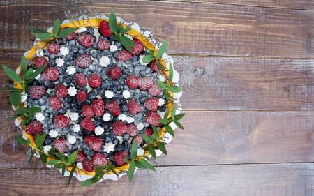 a summer fruit cake rolled in  yellow biscuitの写真素材
