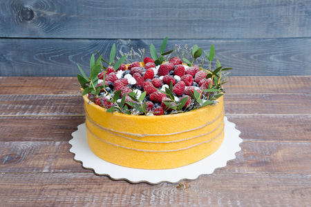 a summer fruit cake rolled in  yellow biscuitの写真素材