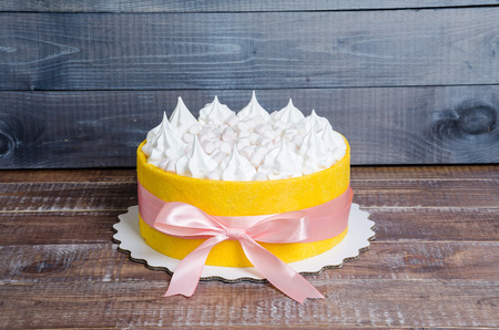 cake rolled in  a yellow  biscuit with vanilla merengue and marshmallow