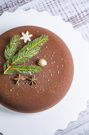 Chocolate velour Christmas mousse cake with some decoration)の写真素材
