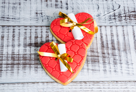 gentle romantic valentine chocolate figures on cookie standの写真素材