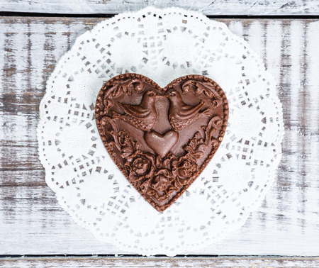 gentle romantic valentine chocolate figures on cookie standの写真素材
