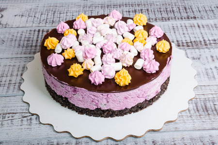 a tasty delicious cheesecake with chocolate decorationの写真素材