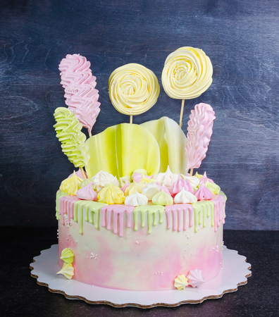 cream cheese cake with chocolate twist and bright merengue decorationの写真素材