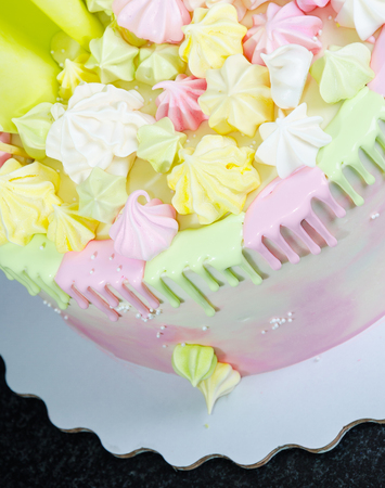 cream cheese cake with chocolate twist and bright merengue decorationの写真素材