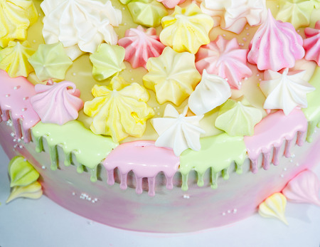 cream cheese cake with chocolate twist and bright merengue decorationの写真素材