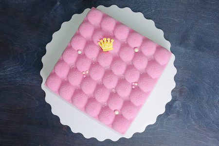 pink chocolate velour mousse cake with pearlsの写真素材