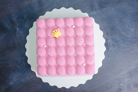 pink chocolate velour mousse cake with pearlsの写真素材
