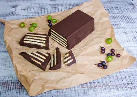chocolate and vanila cookies dessert with gooseberryの写真素材